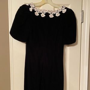 Black velvet cocktail dress. Size 5 juniors. Beautiful pearls around neckline.